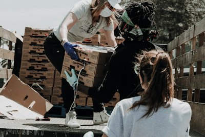 Volunteers packing boxes